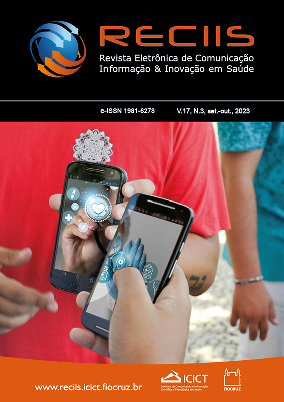 Capa da revista mostra uma pessoa segurando e olhando a tela de um celular
