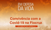 Capa do plano de convivência, com os dizeres "Em defesa da vida: Convivência com a Covid-19 na Fiocruz"