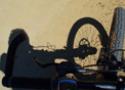 Sombra de uma bicicleta projetada no chão