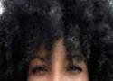 Foto do rosto de uma mulher negra