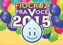 Logo do Fiocruz pra você 2015, com fundo com balões coloridos, em rosa, verde, azul e amarelo, e com a gota do Zé Gotinha