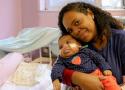 Mãe com bebê portador da microcefalia